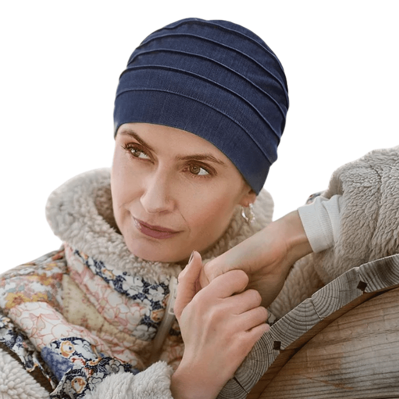 Woman wearing dark blue Christine Headwear Yoga turban in denim fabric, side view