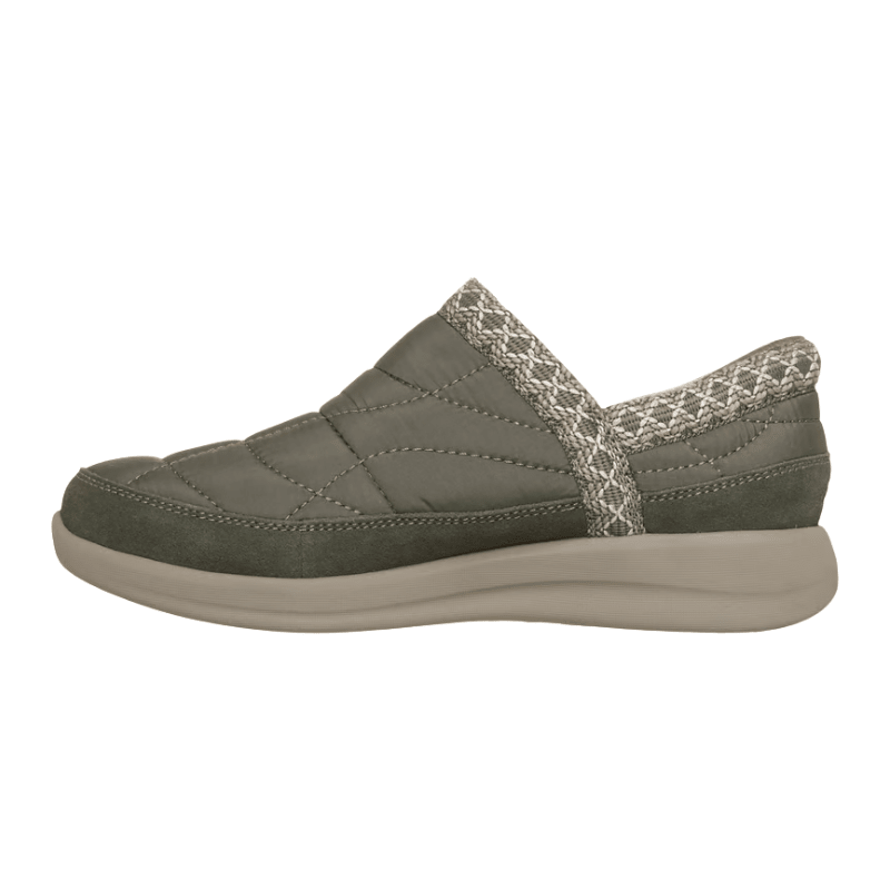 Olive green Skechers women's shoe, side view, featuring a quilted design and easy slip-in opening