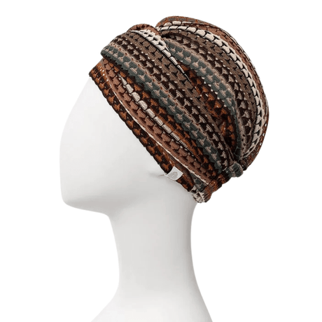 Sapphire Boho knit turban with patterned stripes in brown, golden, and burgundy shades, seen from the side on mannequin