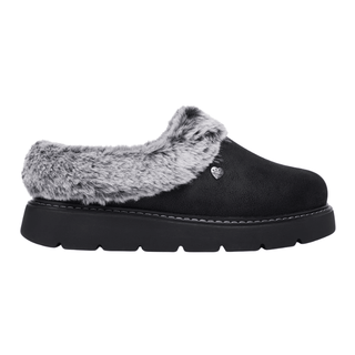 Black Skechers women's slipper with faux suede look, grey faux fur, and thick sole, side view