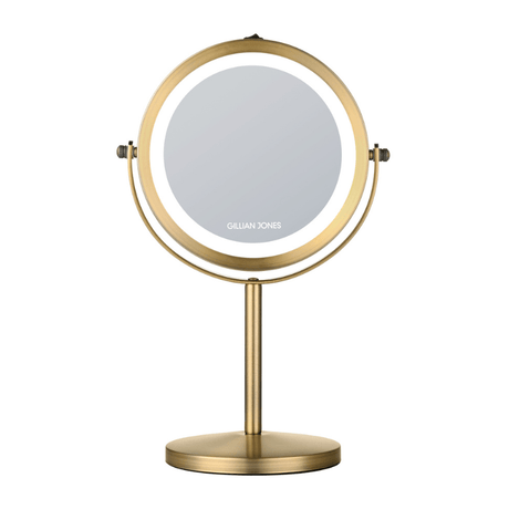 Round golden makeup mirror with LED light, front view showing Gillian Jones logo